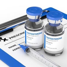 A vial and syringe associated with anabolic steroids