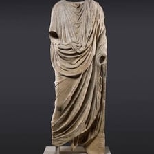 A classical Roman figure depicted in a toga.
