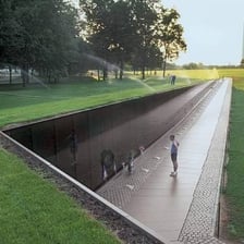 Maya Lin and the black granite Vietnam Veterans Memorial.