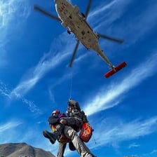 A helicopter being used to evacuate a patient for emergency medical care.