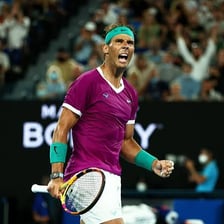 Rafael Nadal competing on a tennis court.