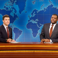Michael Che appearing at the Weekend Update desk.
