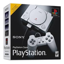 A Sony PlayStation video game console and controller.