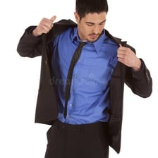 A person putting on a coat