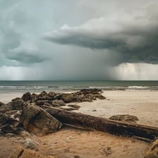 Dark storm clouds threatening a coastline