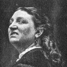 A person displaying a contemptuous sneer