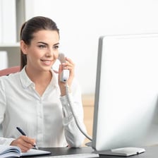 An office assistant working near a manager.