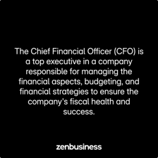 A finance executive reviewing financial documents in an office.
