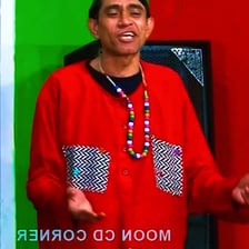 Performers presenting a short comedic scene on a stage