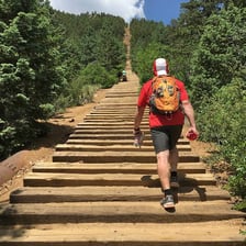 A hiking trail rising at an increasingly steep angle.