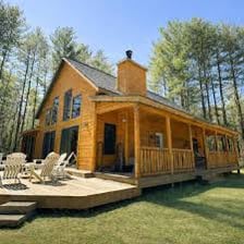 A rustic cabin and a modern condominium building representing homes.