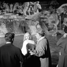 Anita Ekberg in the iconic La Dolce Vita Trevi Fountain scene.