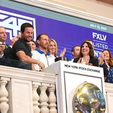 A company representative at a stock-market opening ceremony