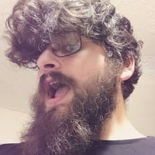 A person with a visibly unruly mass of hair.