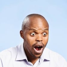 A surprised person reacting to something unexpected.