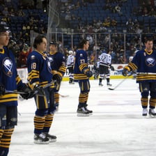 Buffalo Sabres players compete during an ice hockey game.