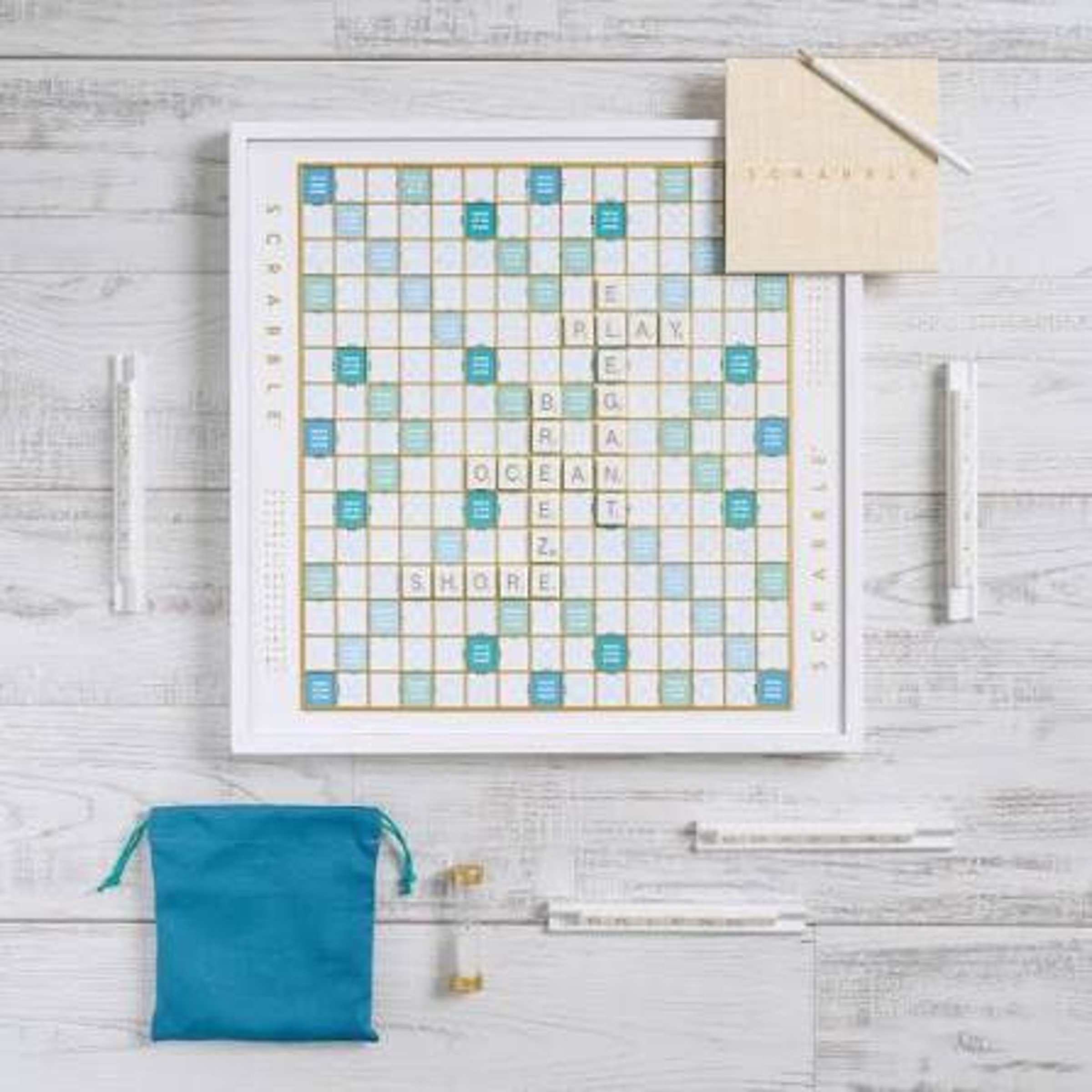 Tile game (8) — Guardian Quick Crossword Answer