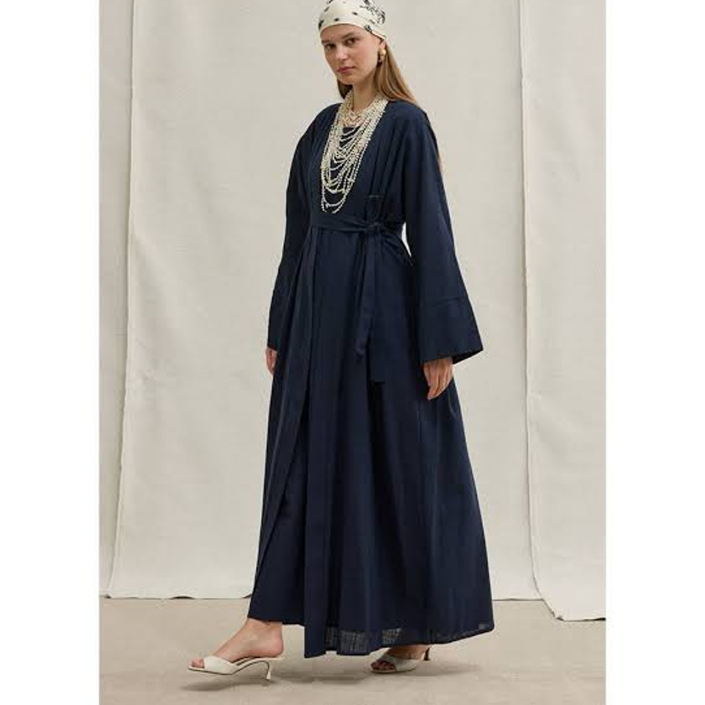 Modest Muslim robe — LA Times Crossword Answer