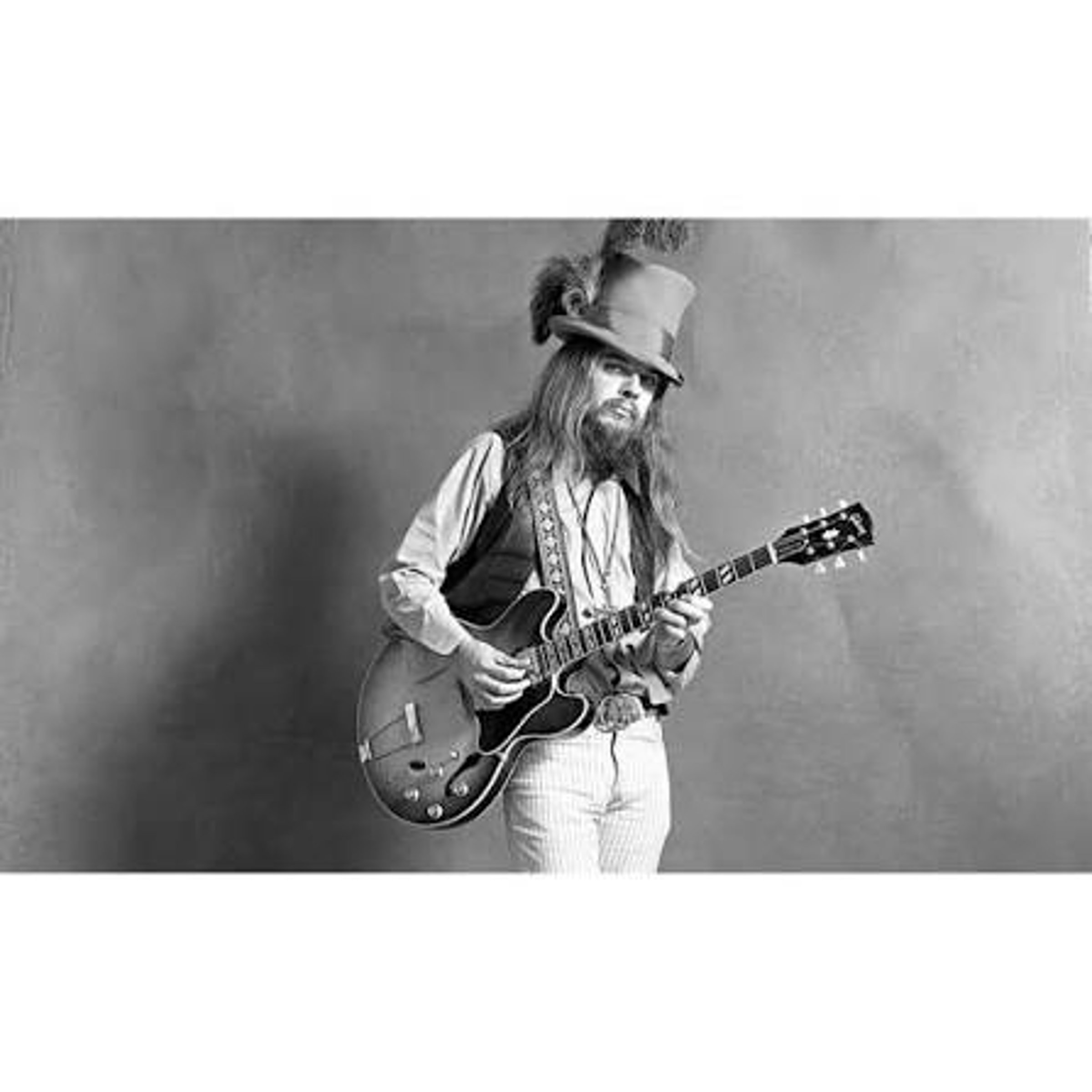 Music’s Russell and Redbone — WSJ Crossword Answer