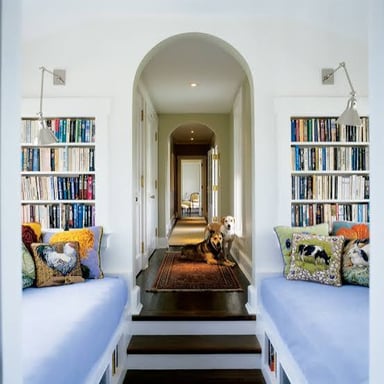 A corridor leads between rooms inside a building.