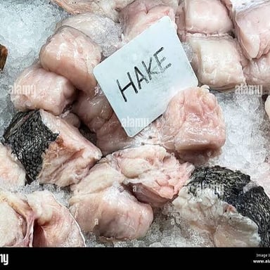 A hake fish displayed on ice.
