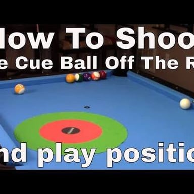A billiard ball rebounding after striking the table cushion.