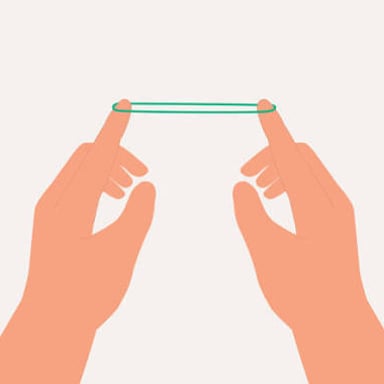 A stretched rubber band illustrating tensile behavior.