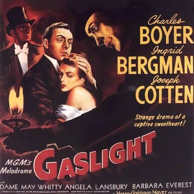 A poster or promotional still from the 1944 film Gaslight featuring Ingrid Bergman and Charles Boyer.
