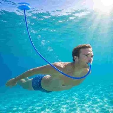 A swimmer underwater breathing through a snorkel tube.