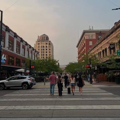 People walking along a downtown Boise, Idaho street.