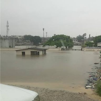 Floodwater covers a low-lying field.
