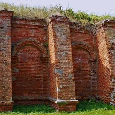 A projecting stone bastion forming part of a historic fortress.
