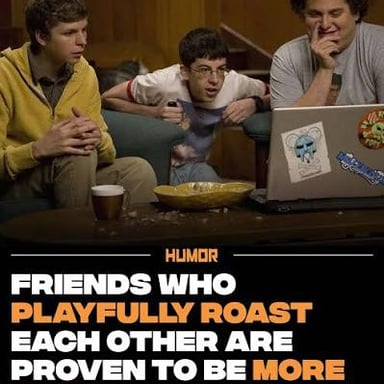 Two friends talking, with one playfully teasing the other.