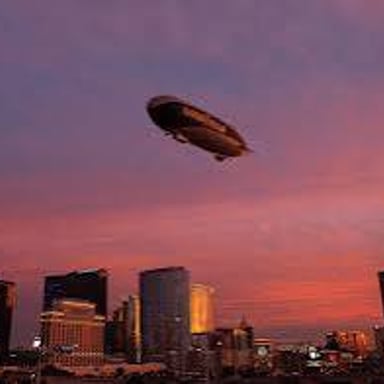 A blimp flying through the sky
