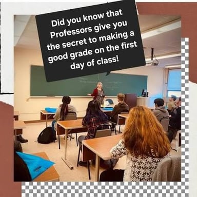 An instructor gives students course handouts in a classroom.