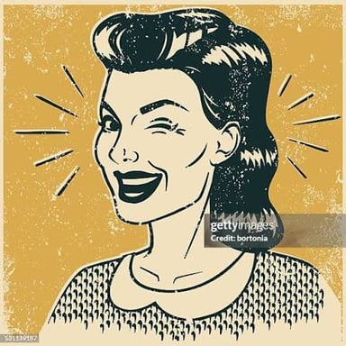 A person wearing a coy, slightly silly smile.