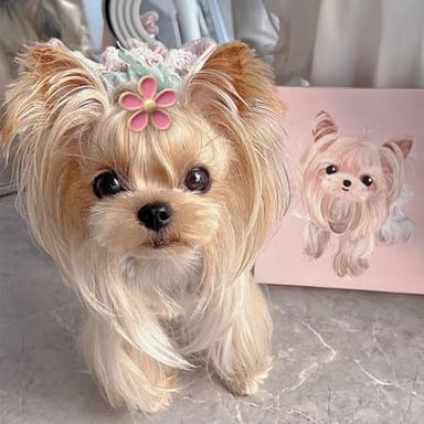 A puppy wearing a pink bow and frilly accessories.
