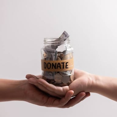 A donor presenting a substantial gift to a charitable cause.