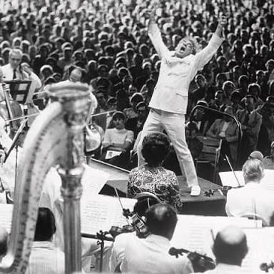 Leonard Bernstein conducting an orchestra.