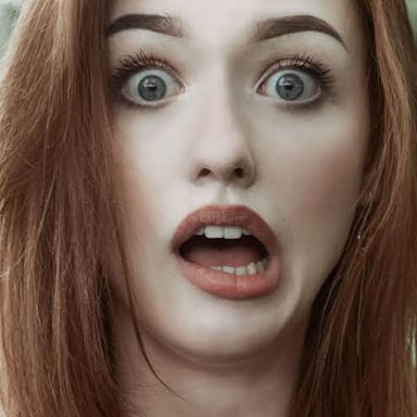 A person making a surprised expression.