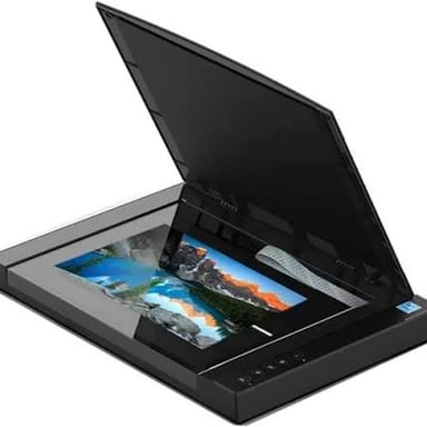 A paper document being scanned on a flatbed scanner.