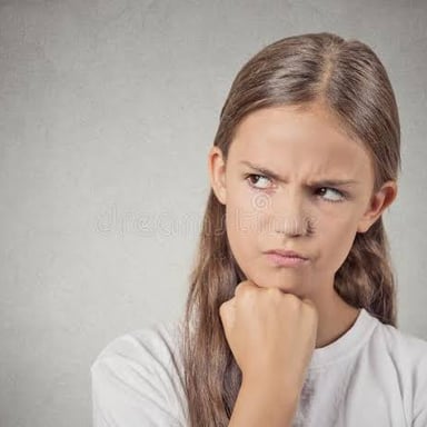 A person looks irritated after a disagreement.