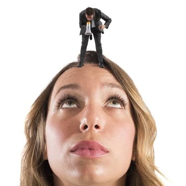 A person listening quietly after being reprimanded