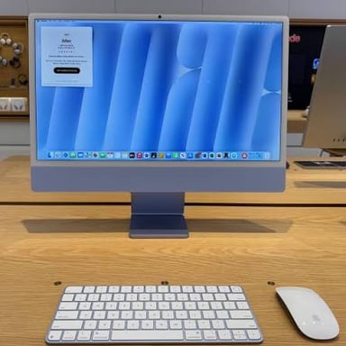 An Apple iMac desktop computer with its display and stand.