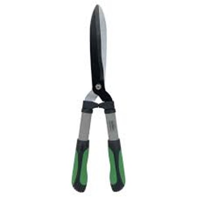 A gardener cutting back a hedge with pruning shears