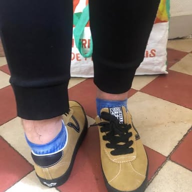 A person turning around a planted foot