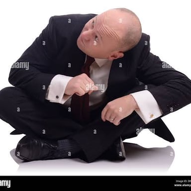 A person ducking to avoid an incoming object