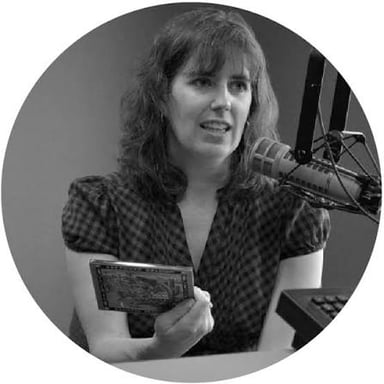 A person speaking into a microphone, illustrating a regional accent.