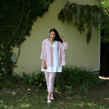 Flax plants pictured with a linen jacket.