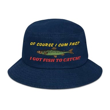 A hand reaches to catch a hat as it falls.